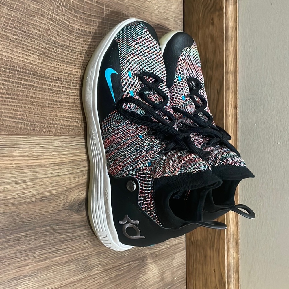KD 11 black rainbow, slight wear on bottom.still in great shape.wore maybe twice